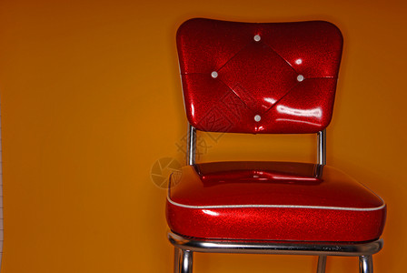 红色老旧变换椅背景图片