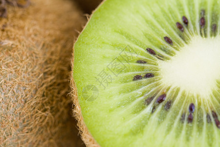Kiwi 背景水果情调棕色绿色食物异国热带种子背景图片