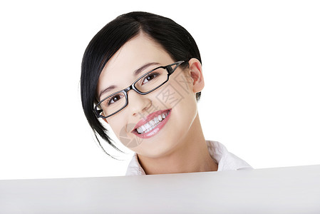 一盔一带标语微笑着的年轻商业女商务人士显示空白招牌工人广告成功生意人女士办公室展示标语推介会成人背景