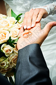 结婚戒指白色假期新郎新娘庆典背景图片
