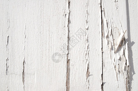 粉碎白涂料木头裂缝材料白色背景图片