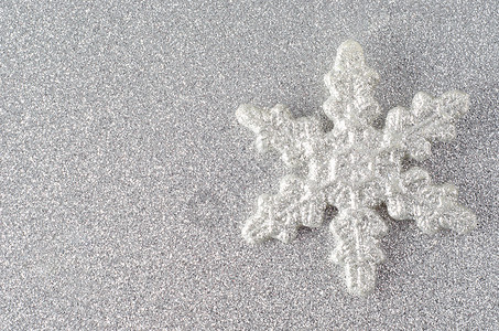 闪闪的雪花银闪光雪花背景