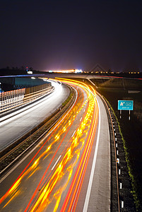 夜间高速公路  长时间曝光  灯光线景观驾驶车道旅游交通运输城市旅行建筑技术背景图片