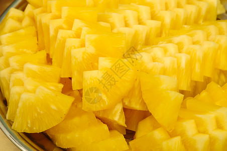 切片菠萝黄色异国腌料食物甜点肉质盐渍热带饮食白色高清图片