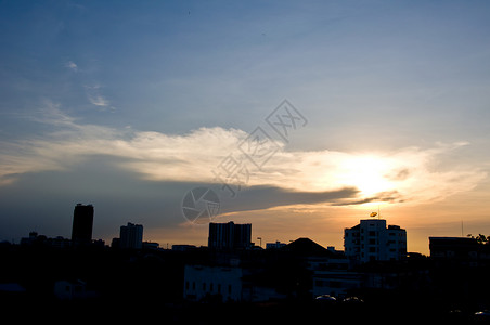 城市日落太阳阴影天空黄色反射建筑办公室橙子景观背景图片