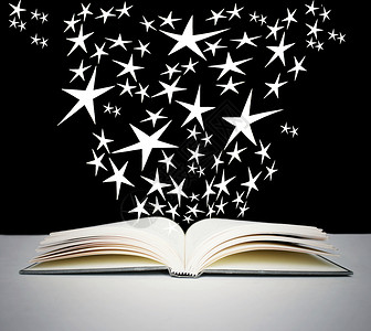魔法星星开放书本和亮星魔法床单写作星星阅读艺术教育黑色灰色故事背景