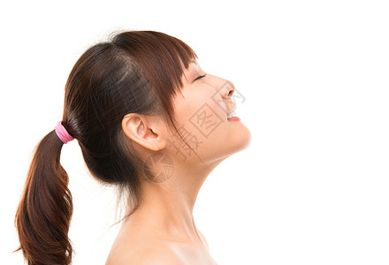 亚裔女性皮肤护理员的侧面观透气清新背景图片