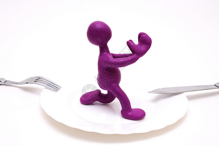 玩具刀普丁乞求生命的紫色木偶乐趣活动工艺太空人推介会惊喜雕塑孩子艺术雕刻背景