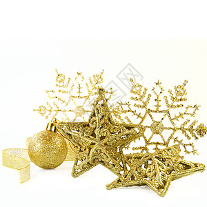 圣诞节装饰品星星圆形火花传统丝带白色庆典雪花金子反射背景图片