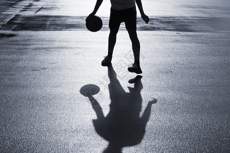 拿篮球人街头篮子喜悦运动蓝色行动色调活动娱乐街道街球活力背景