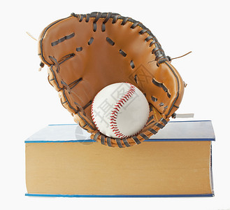 棒球 手套和书本背景图片
