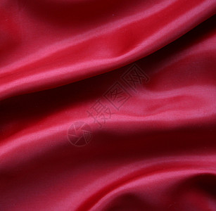 平滑的红丝绸背景纺织品热情红色奢华柔软度织物材料投标窗帘海浪背景图片