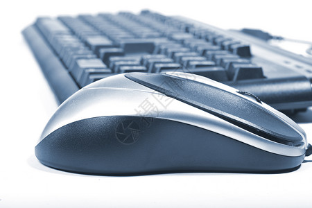 键盘上的鼠标商业电脑办公室灰色桌子网络老鼠背景图片
