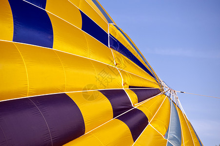漂浮黄色热气球热气球展示飞行黄色热气天空晴天漂浮蓝色橙子热气球背景