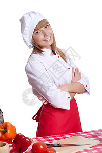 具有吸引力的女厨师帽子服务美食黑发烹饪手势微笑职员饮食餐厅背景图片