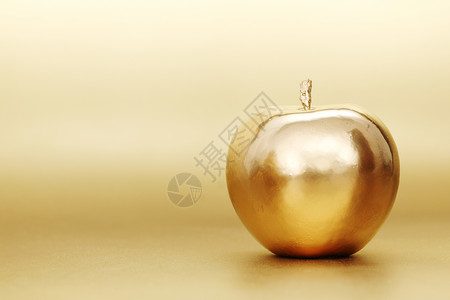 金苹果金子饮食贸易宏观甜点营养黄色食物金属水果背景图片