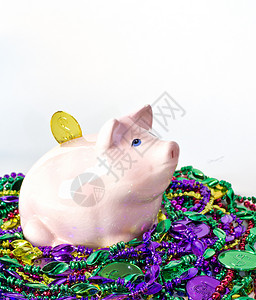 彩猪狂欢节猪绿色红色面具存钱罐彩珠珠子舞会硬币小猪金子背景