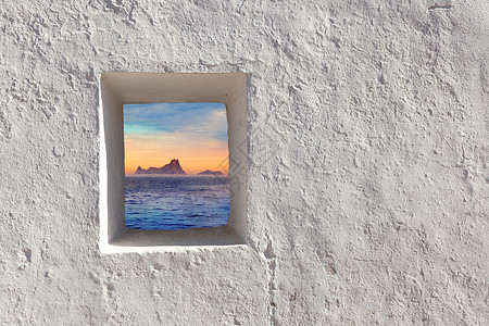 巴利阿里群岛Es Vedra通过窗户日落高清图片