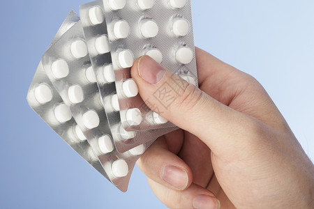 药片药品白色吸塑包装药物医疗背景图片
