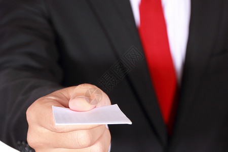 抽象背景名片显示商业名片的商务人士红色白色男性套装手势商务身份手指领带手臂背景