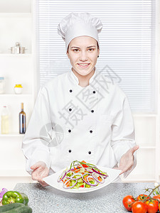 提供素食用餐的厨师盘子奶油女性沙拉酒店白色食物厨房工业餐厅背景图片