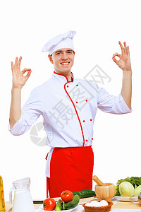 青年烹饪准备食品酒店餐厅装潢帽子美食厨房生活盘子男人围裙背景图片