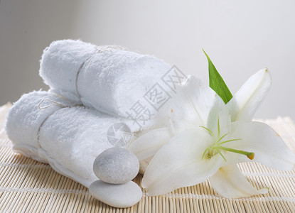 斯帕护理洗澡疗法花瓣沙龙治疗棉布产品毛巾芳香背景图片