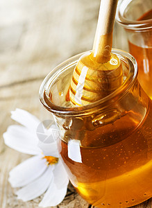 亲爱的生活味道产品芳香玻璃营养蜂蜜桌子植物液体背景图片