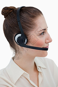 装戴耳盔的操作者的肖像中心接待员耳机帮助微笑商务营销服务台热线秘书背景