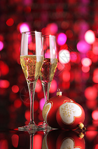 除夕不放假与香槟一起庆祝派对假期摄影彩灯酒精活动红色礼物周年气泡背景