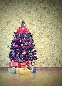 圣诞树假期节日礼包木地板礼物背景图片