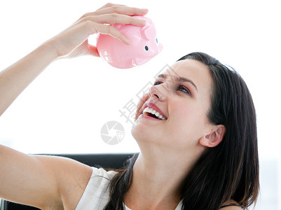 动画银行素材可爱的女商务人士看着小猪银行背景
