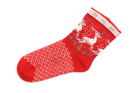 圣诞丝袜白色季节性庆典季节礼物展示短袜花圈传统红色背景图片