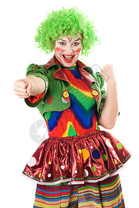 小丑拳头喜悦的女小丑肖像情感假发快乐微笑裙子成人马戏团艺术化妆品成功背景