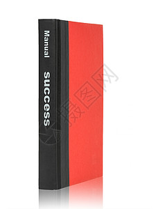 企业手册封面成功商业手册和黑色带的红皮封面书背景