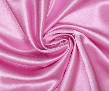 平滑优雅的粉色丝绸作为背景材料布料织物海浪曲线紫丁香投标婚礼纺织品薰衣草背景图片