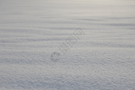 雪面背景粮食寒意季节蓝色冻结宽慰地面假期宏观阴影高清图片