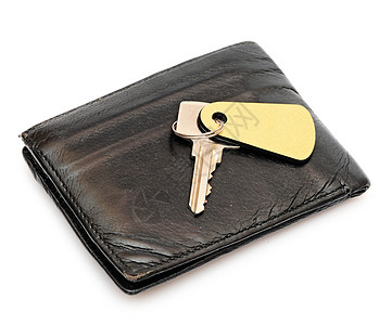 黑色钥匙带有空白金色标签的密钥 用于您在黑色 pur 上孤立的文本背景