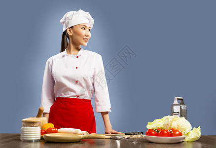 亚洲女厨师饮食桌子烹饪主妇蔬菜裂缝女性女士食谱奢华背景图片