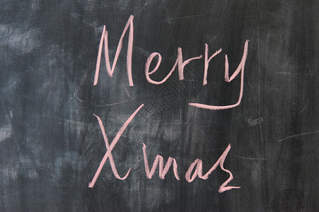 写笔记 圣诞快乐粉笔教育庆典绘画木板写作图书假期黑板背景图片