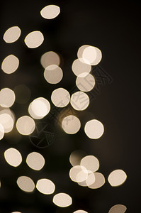 圣诞灯模糊闪光黄色庆典假期背景背景图片