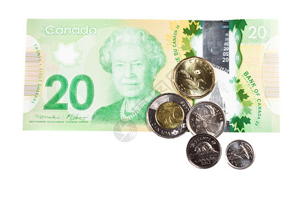 加拿大渥太华 艾薇儿 13 日 2013 年 所有实际的加拿大货币都被白色隔离银行纸币财富金融现金账单银行业储蓄经营理念背景图片