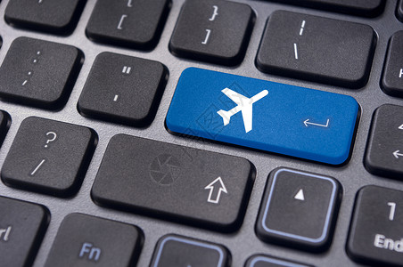 在线订机票 键盘上标有飞机标志纽扣交通工具商业互联网客票旅行运输手续空气电子背景