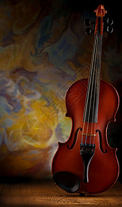 木板上的老小提琴背景图片
