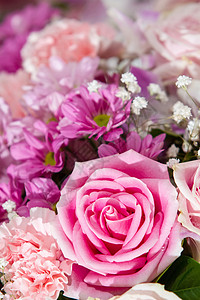 玫瑰花混合花束婚姻粉色红色花瓣玫瑰美丽婚礼背景图片