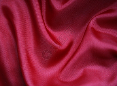 平滑的红丝绸背景奢华热情纺织品红色窗帘海浪投标织物柔软度材料背景图片