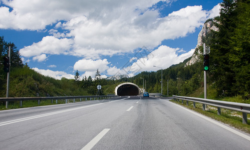 快速提分通往隧道的道路街道运动车辆蓝色运输通道路线旅行汽车速度背景