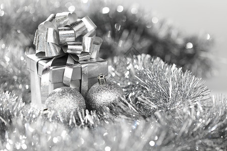 圣诞盒子银色圣诞卡圆圈乐趣盒子魔法玻璃丝带礼物星星团体派对背景