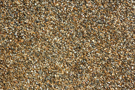 灰色贝壳小石头和小石子沙滩 紧闭背景