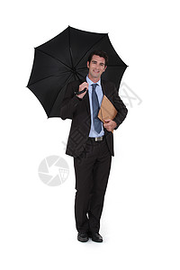 戴雨伞的商务人士高清图片